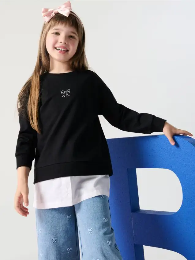 Felpa con orlo camicia cucito - nero