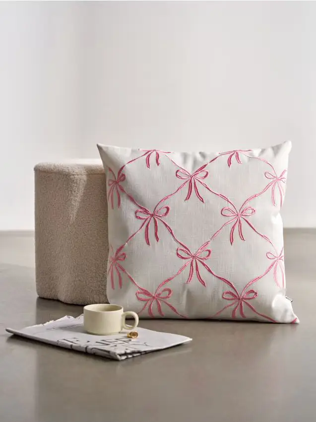 Fodera per cuscino con motivo di fiocchi - bianco