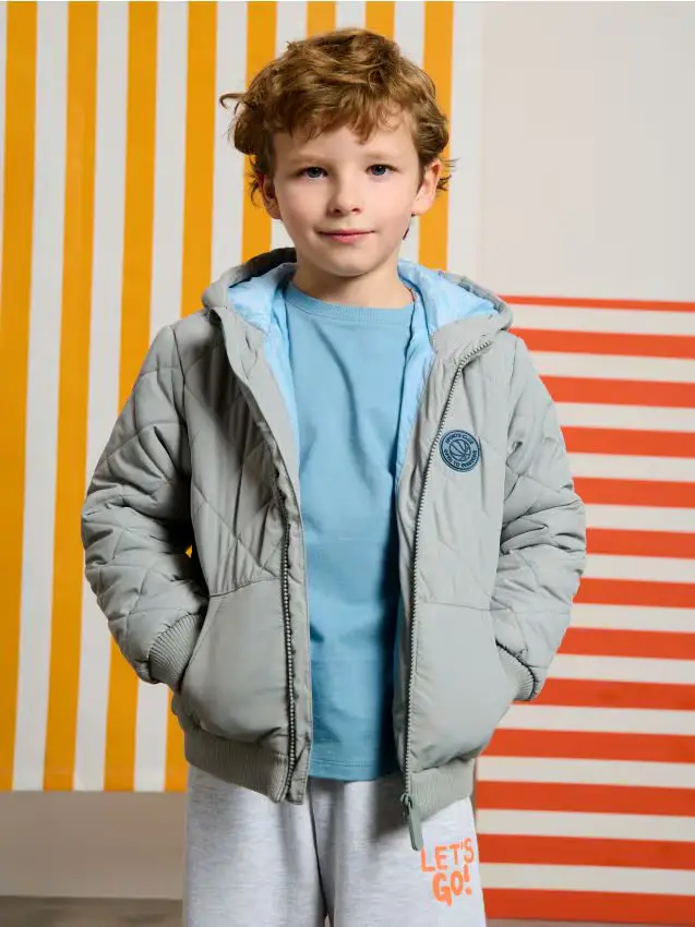 Giacca trapuntata con cappuccio - grigio