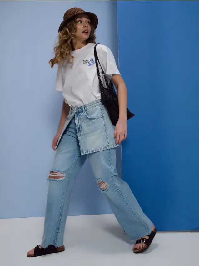 Jeans baggy a vita bassa con effetto used - blu