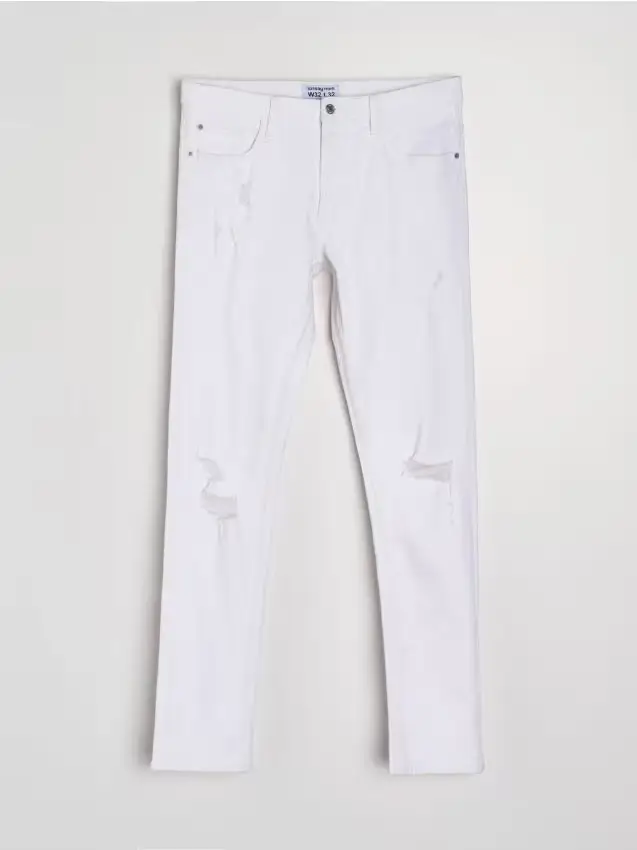 Jeans slim fit con abrasioni - bianco