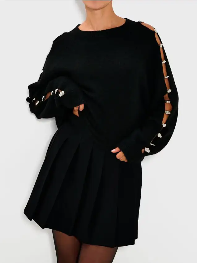 Maglione con decorazioni sulle maniche - nero