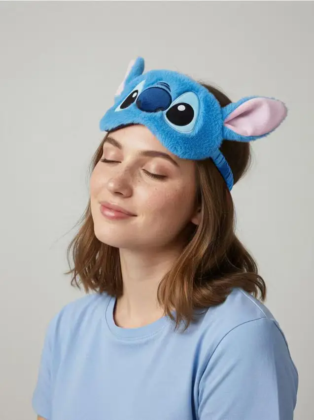 Mascherina da notte in peluche Lilo & Stitch - blu pallido