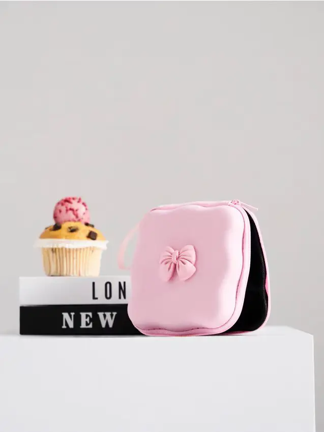 Organizer per cavi con motivo a fiocco - rosa