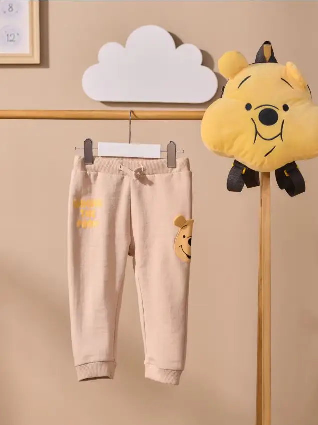 Pantaloni con dettagli 3D Winnie the Pooh - beige