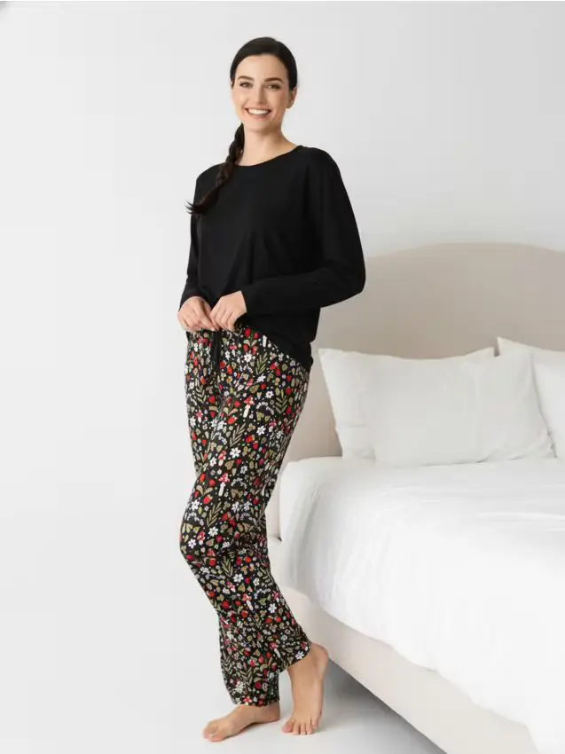 Pantaloni da pigiama a gamba larga con motivo floreale - multicolor