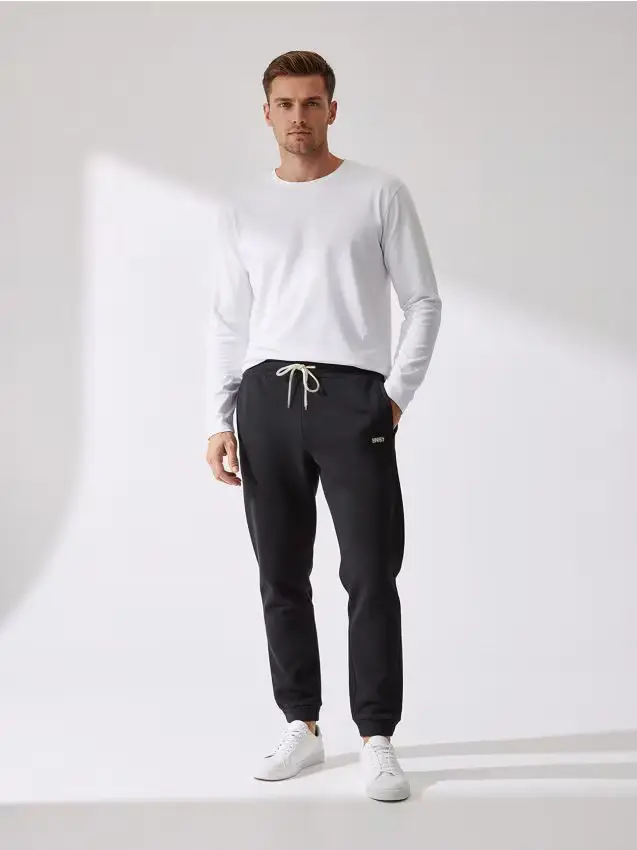 Pantaloni da tuta - nero