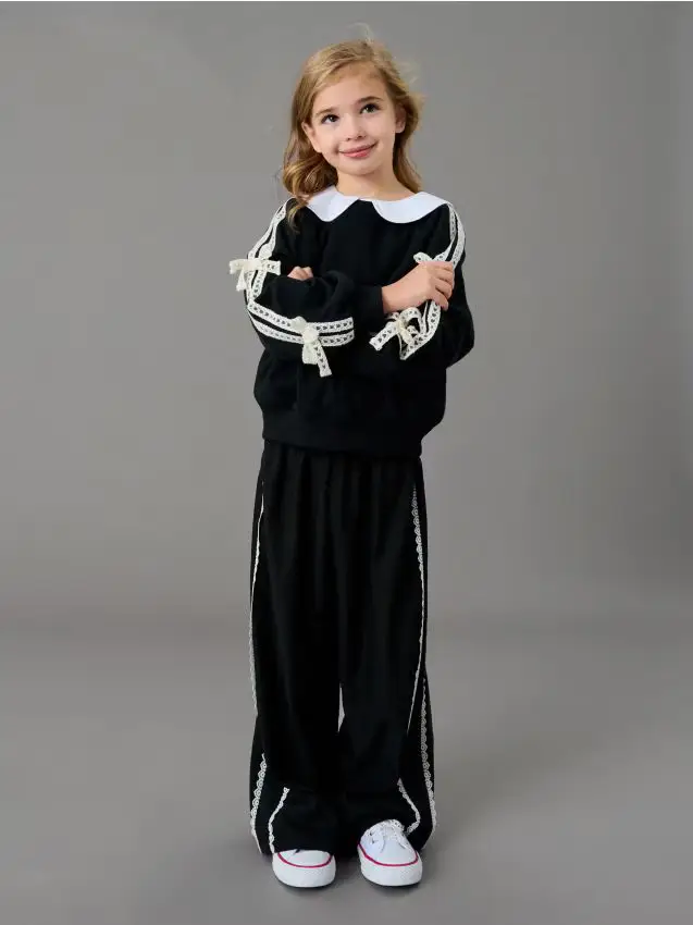 Pantaloni in tessuto con pizzo decorativo - nero