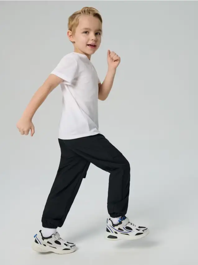 Pantaloni jogger sportivi con stampa riflettente Active - nero