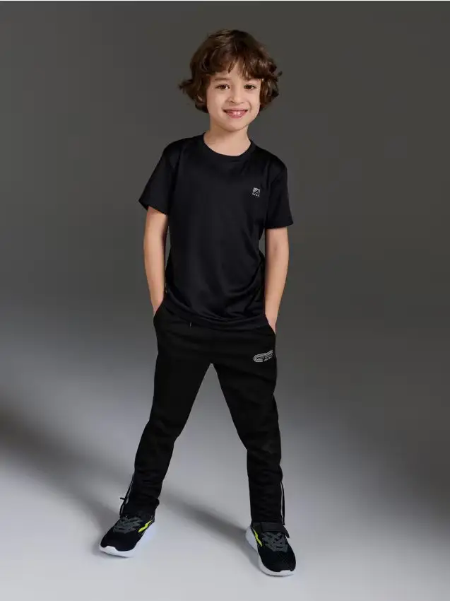 Pantaloni sportivi slim con stampa riflettente Active - nero