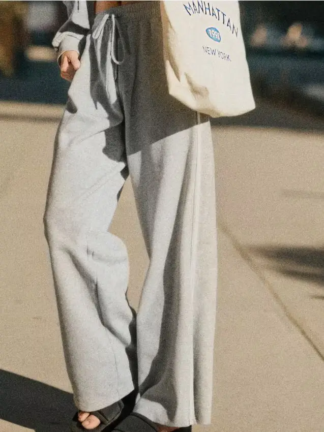 Pantaloni tuta a gamba larga con bande laterali - grigio chiaro