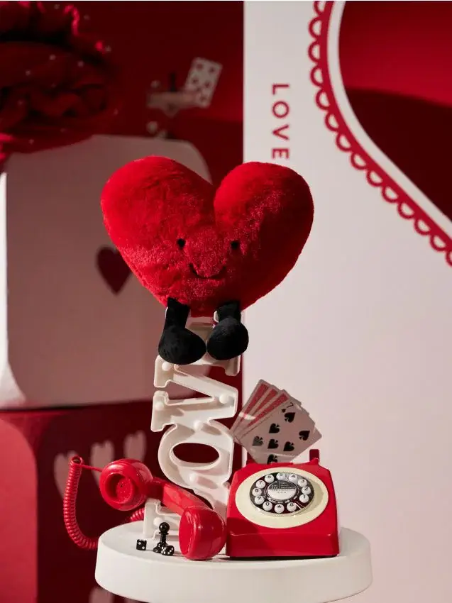 Peluche a forma di cuore con gambe - rosso