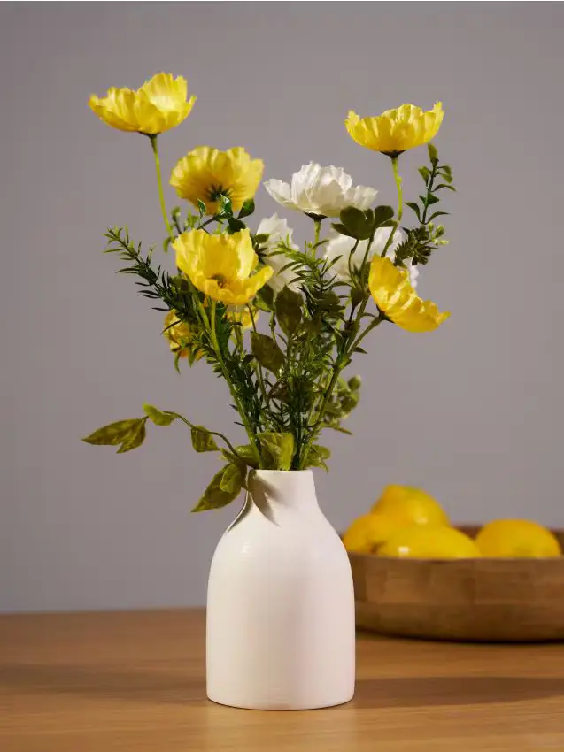 Pianta decorativa in vaso - giallo chiaro