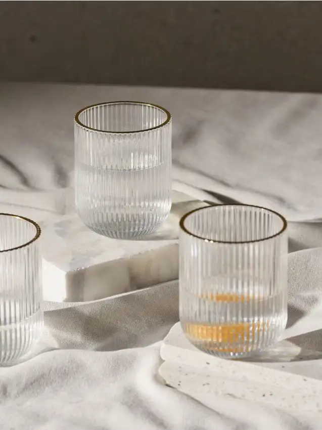 Set di bicchieri zigrinati con bordo dorato 4 pack - clear