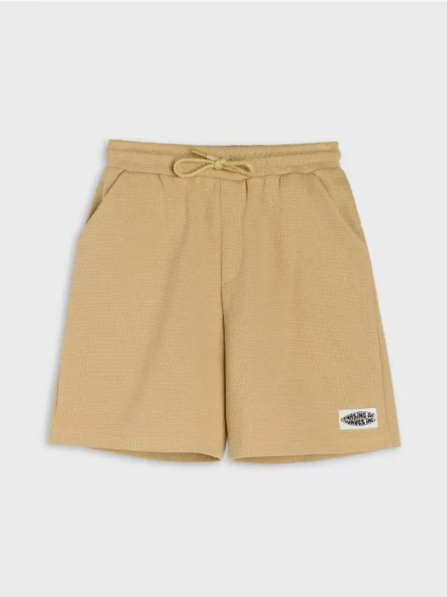 Shorts in cotone dalla vestibilità loose in maglia waffle - beige