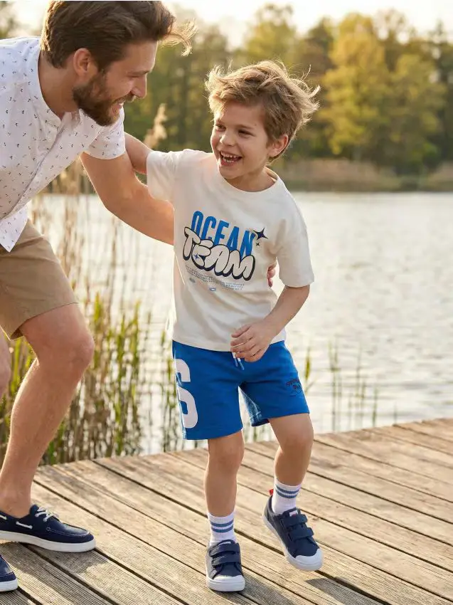 Shorts in materiale French Terry con ricamo e regolazione in vita - blu