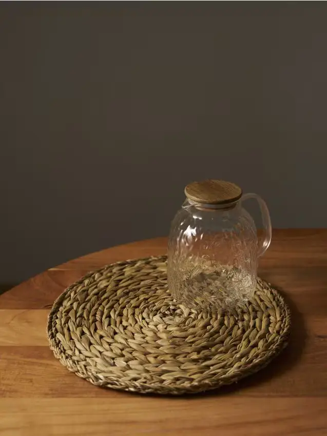 Sottopiatto rotondo intrecciato - beige