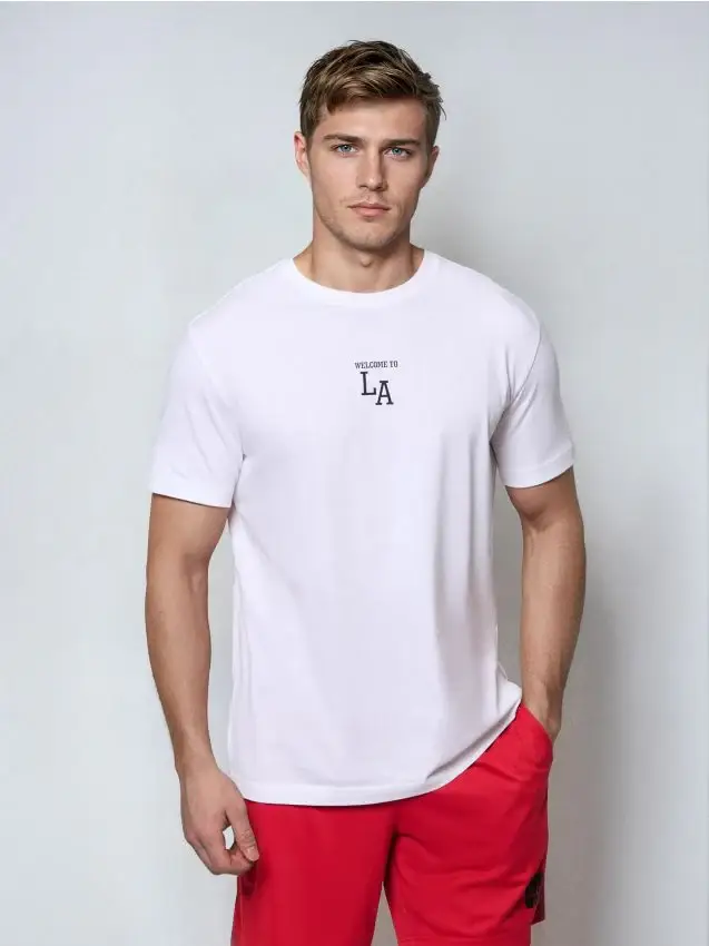 T-shirt in cotone con scritta Welcome to LA - bianco