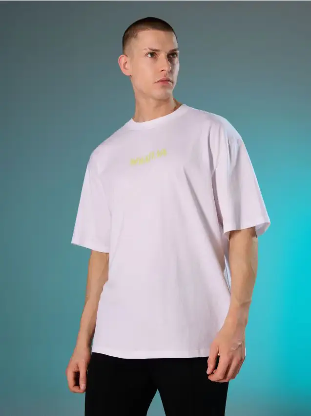 T-shirt in cotone con scritta Whateva - bianco