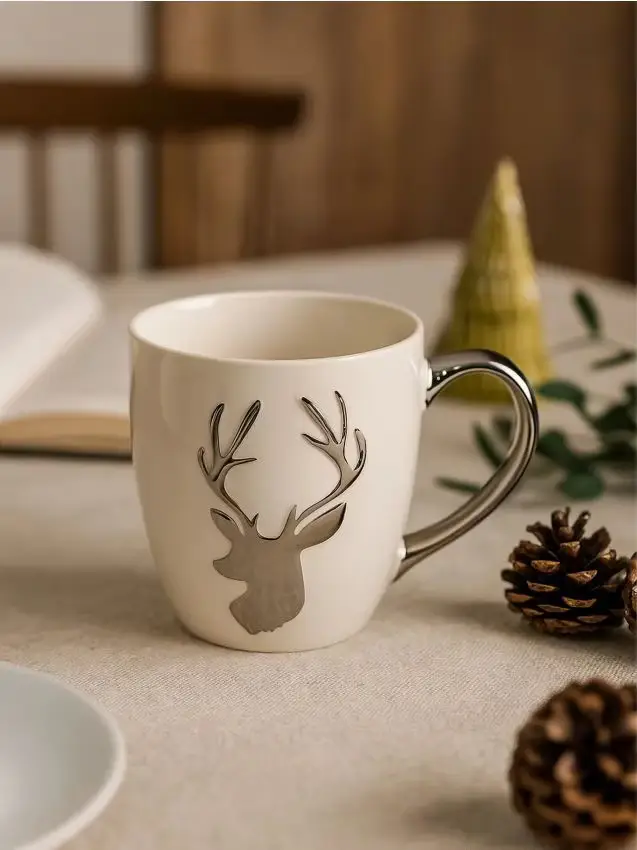 Tazza con motivo di renna - argento