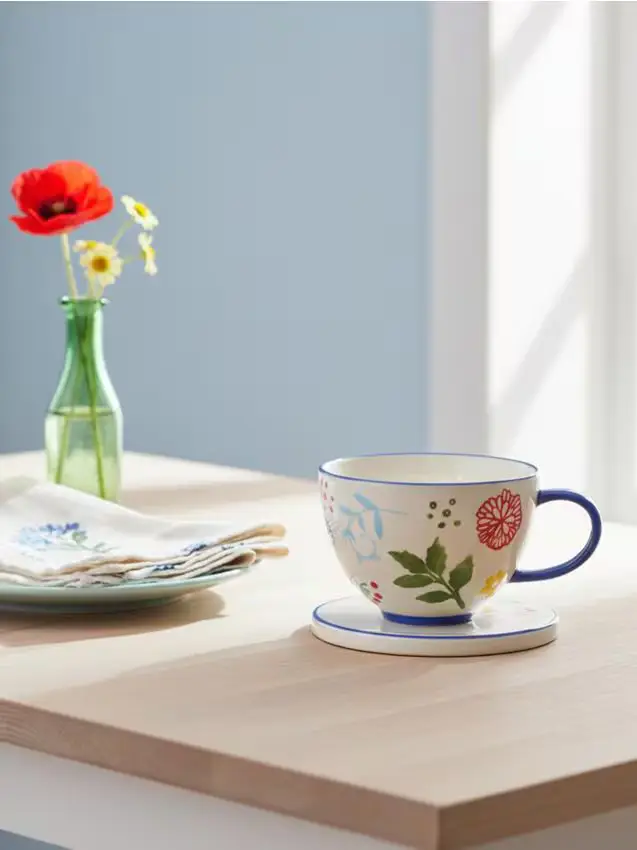 Tazza in ceramica con motivo floreale - blu scuro