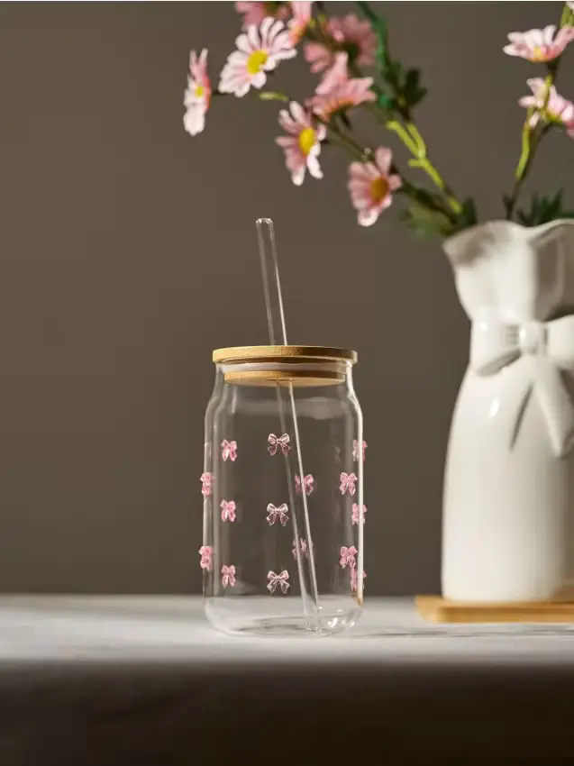 Tazza in vetro con coperchio e cannuccia con fiocchi - clear