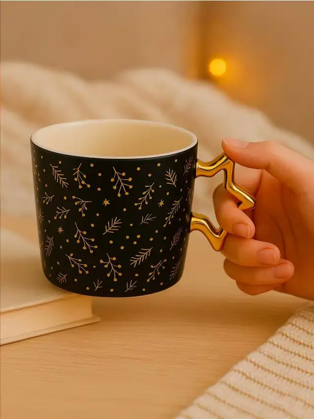 Tazza natalizia in ceramica con manico dorato a forma di stella - oro