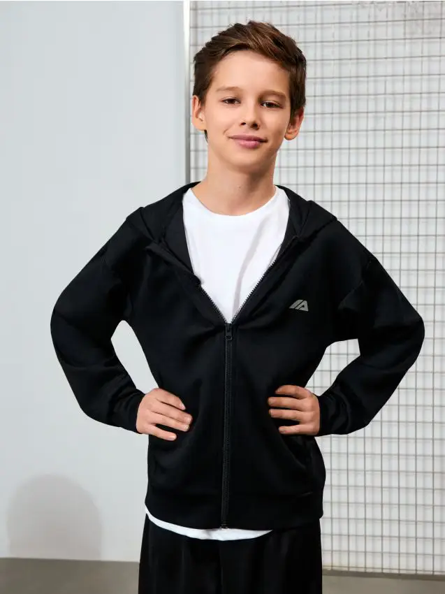 Top da jogging con zip e cappuccio - nero