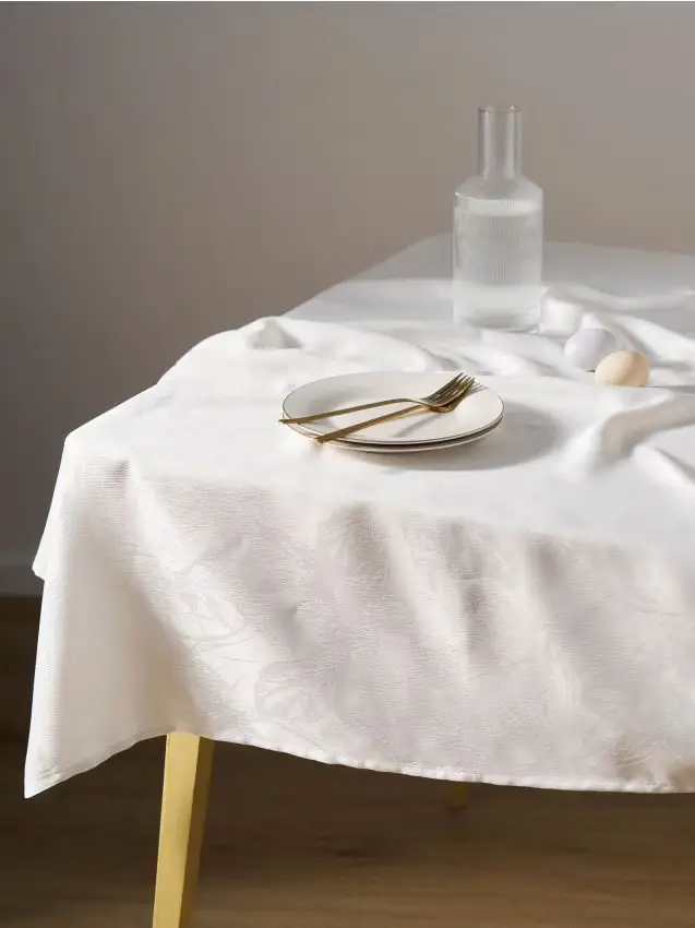 Tovaglia con motivo floreale goffrato - bianco