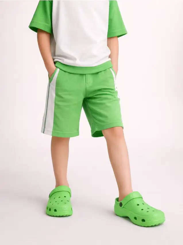 Zoccoli con cinturino sul tallone - verde