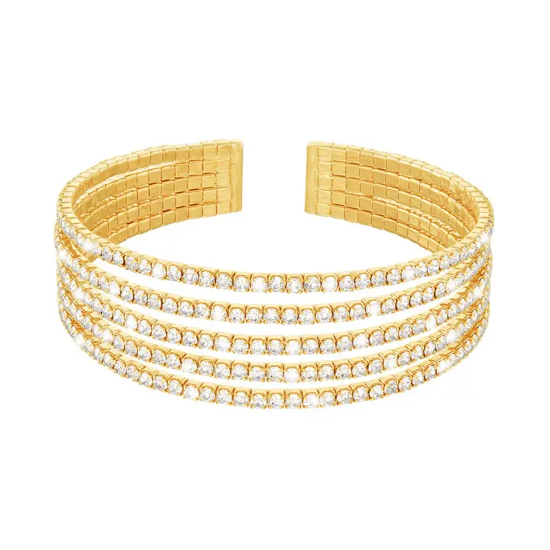 Bracciale rigido multifilo in metallo dorato con strass