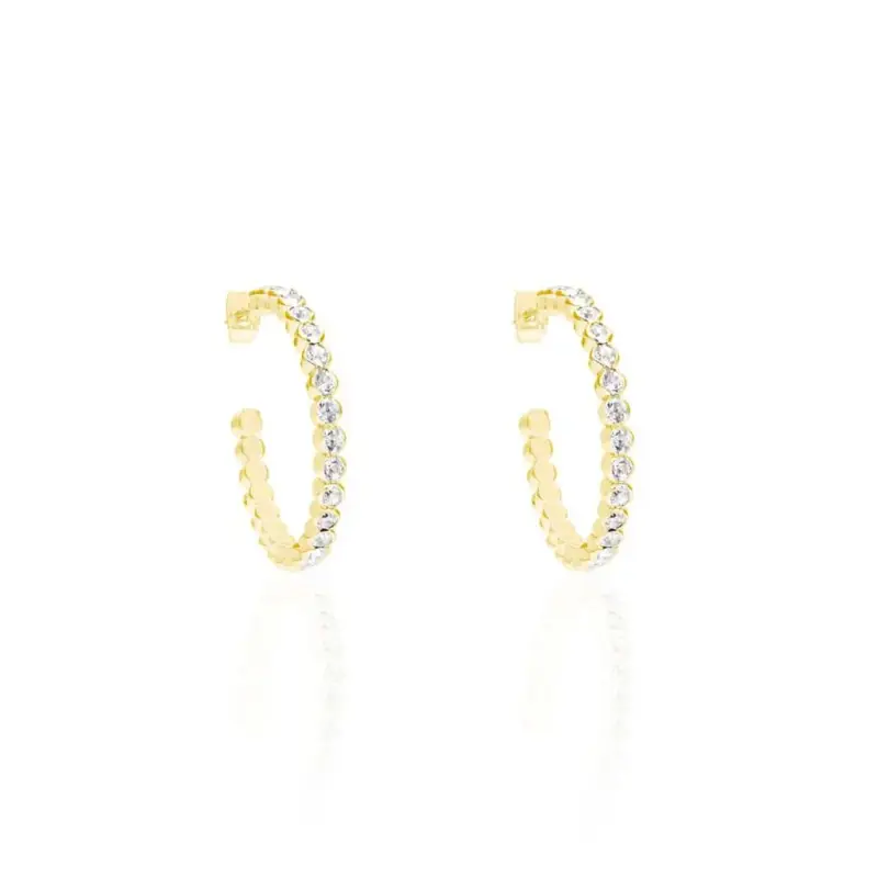 Orecchini a cerchio in metallo dorato e cristalli