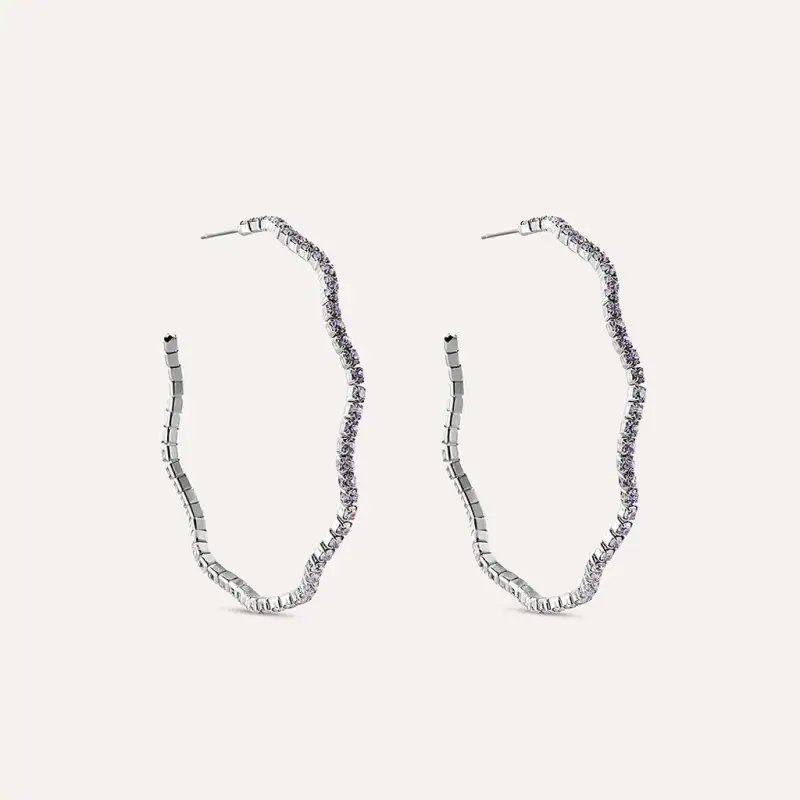 Orecchini a cerchio in metallo rodiato e cristalli