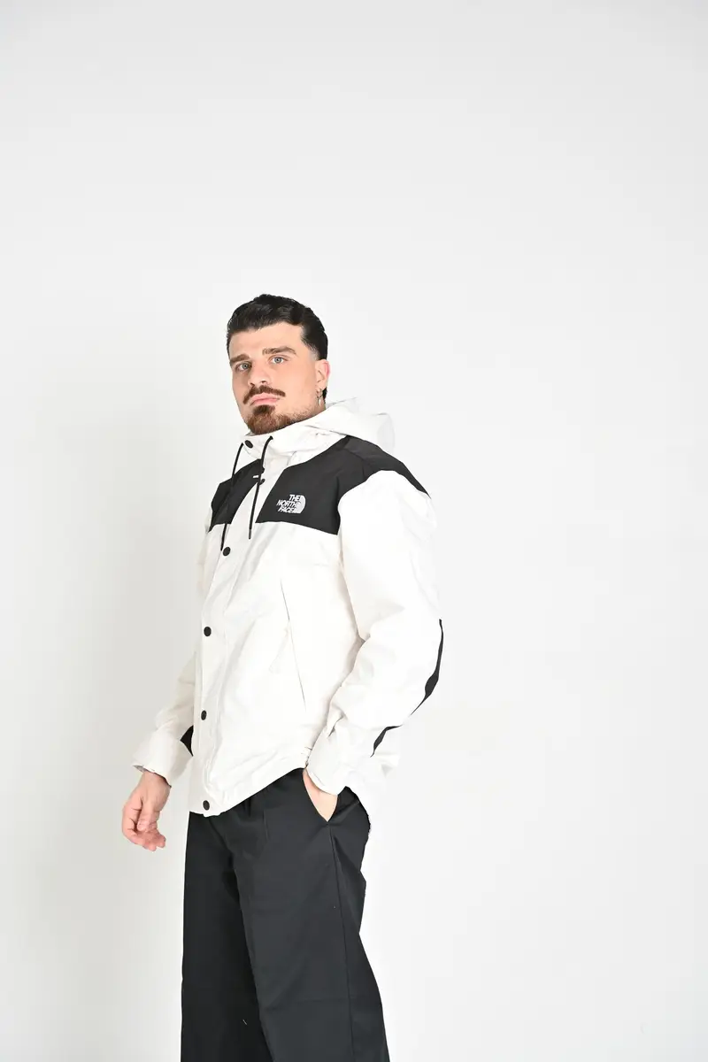 THE NORTH FACE Giacca a vento Reign On bianca e nera da uomo miniatura 3