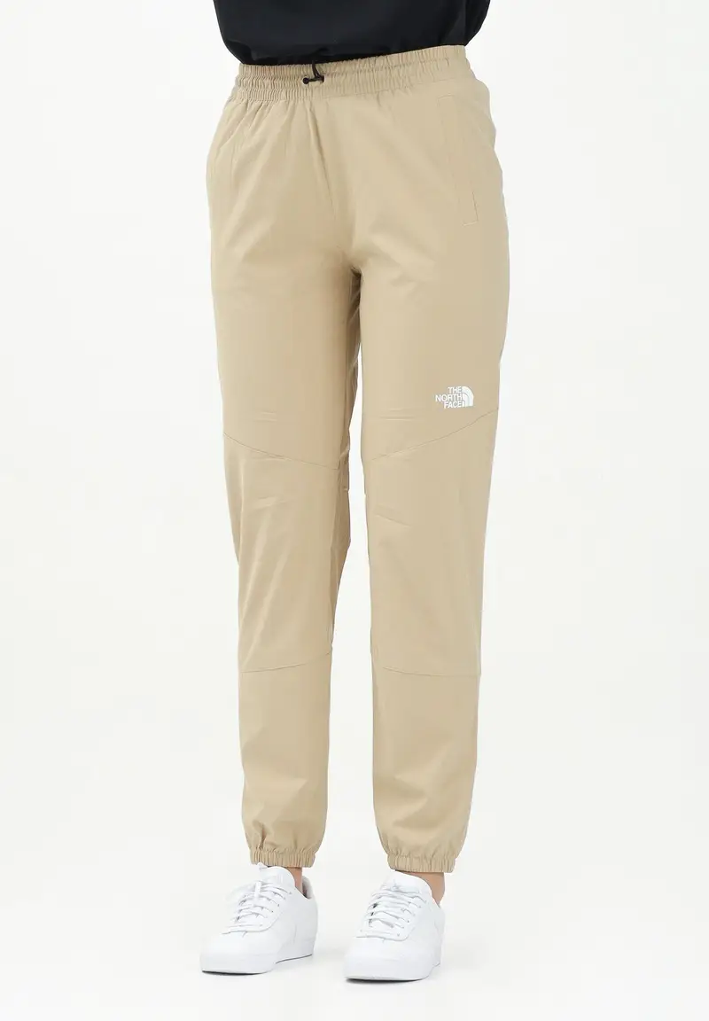 THE NORTH FACE Pantalone antivento Mountain Athletics beige da donna