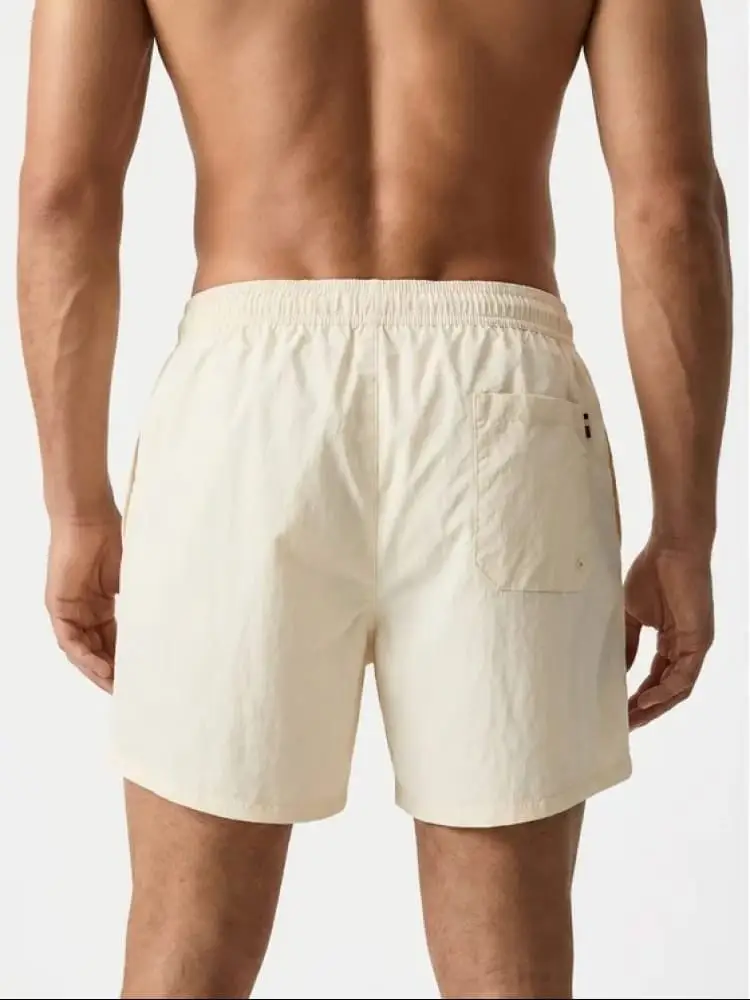 costume crema uomo mini logo miniatura 2