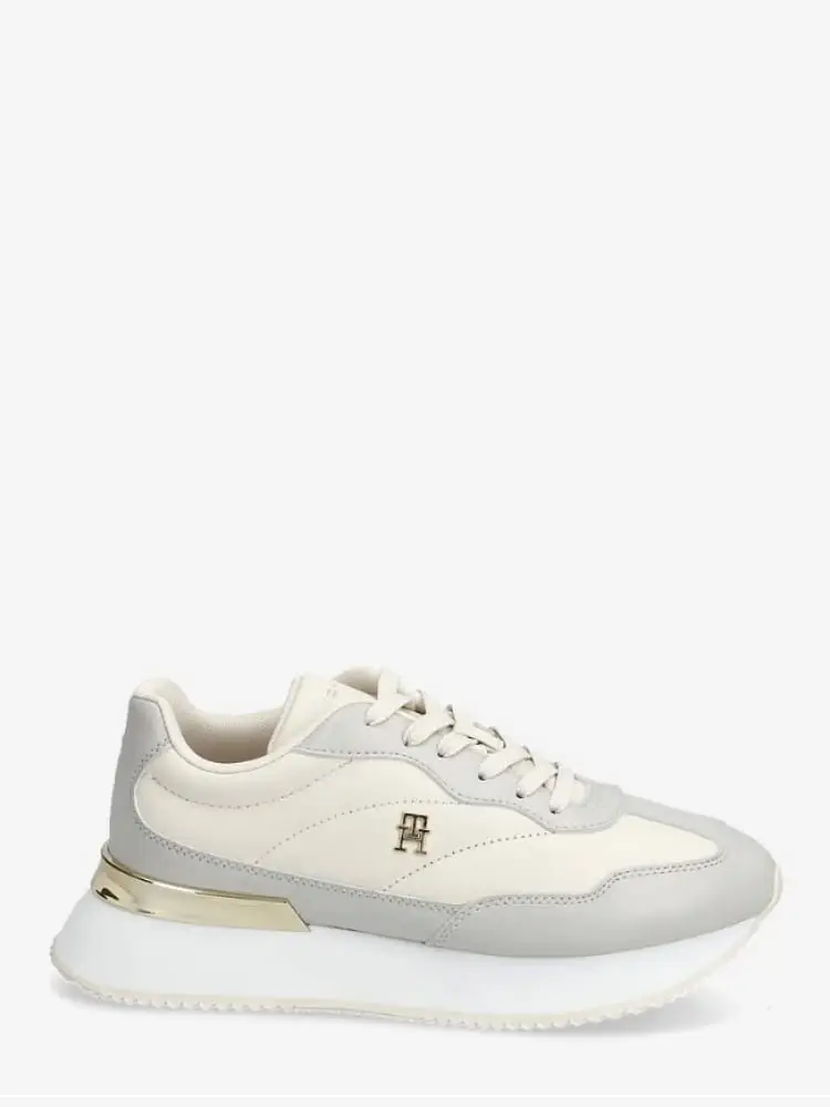 sneakers in pelle color panna e grigio con monogramma th metallico