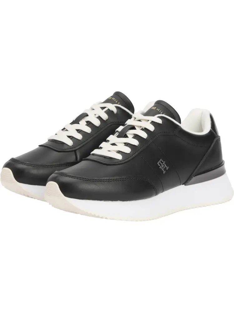 sneakers in pelle nera con inserti metallizzati sul retro e placchetta monogramma th sul lato