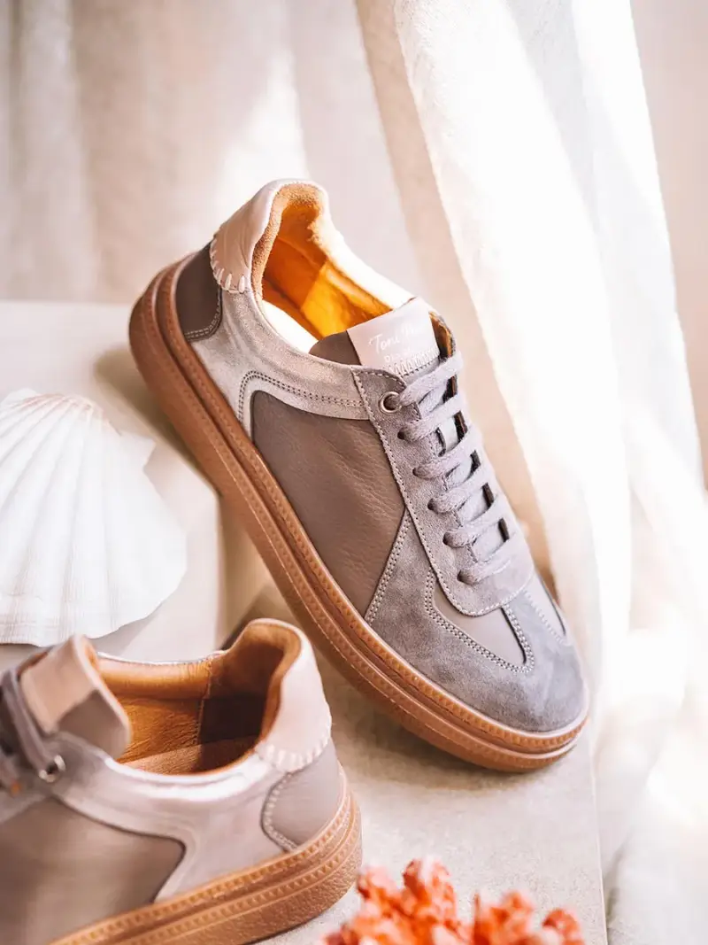 Scarpe sportive da donna in pelle con stampa animal print TAUPE