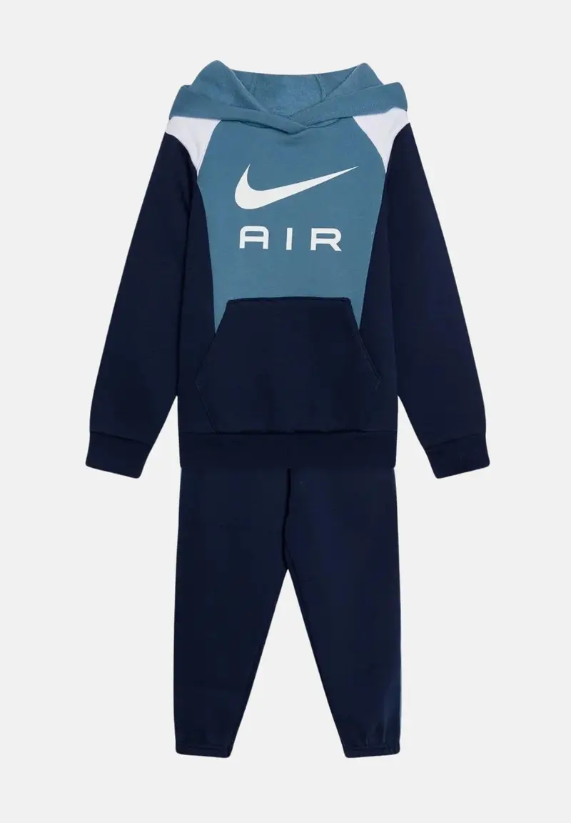 Tuta azzurra e blu da neonato