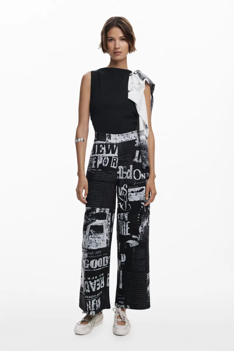 Tuta combinata stampa giornale