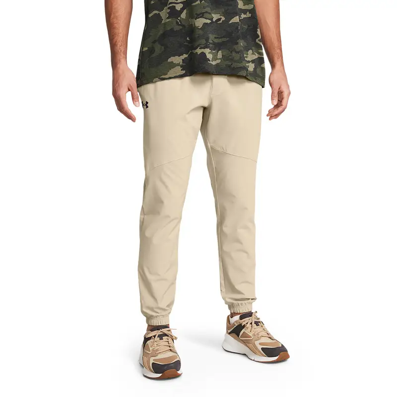 Pantaloni da jogging in tessuto elasticizzato Under Armour da uomo | Under Armour Beige