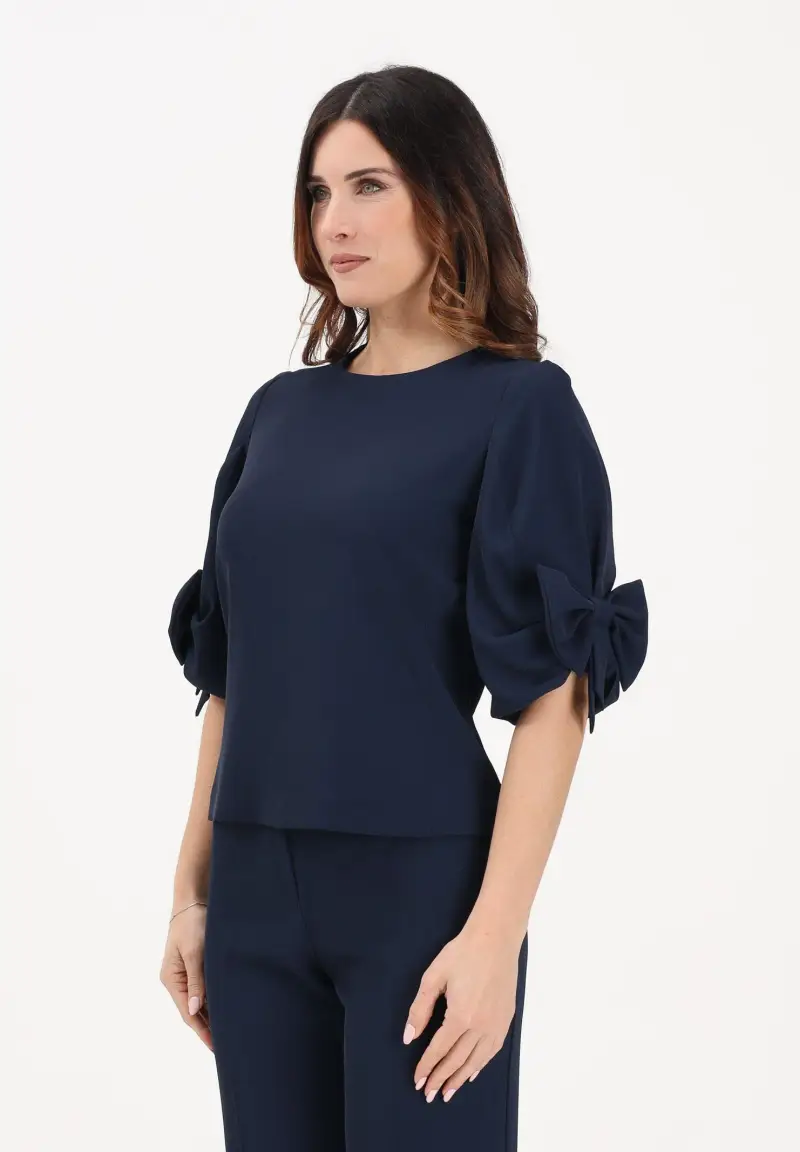 Blusa blu da donna con fiocco applicato