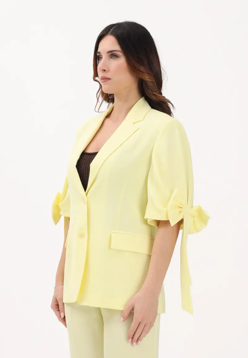 Giacca monopetto gialla da donna con fiocchi