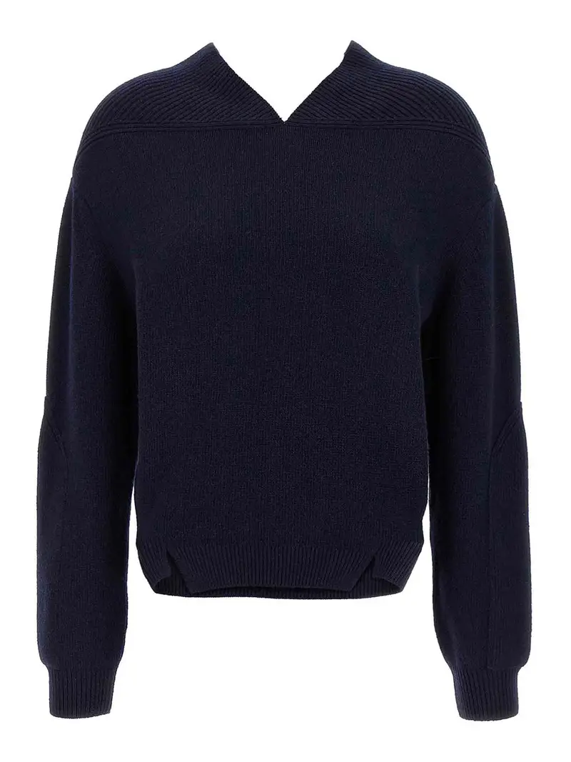 Maglione di dettaglio del giogo a v-collo Blu