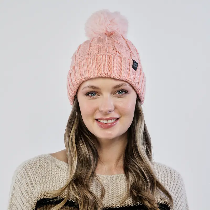 Berretto rosa con pon pon e risvolto