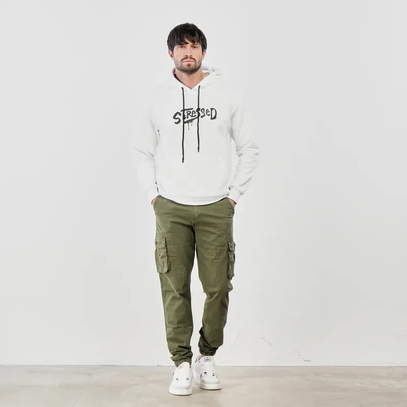 Pantaloni verdi con tasconi e polsini