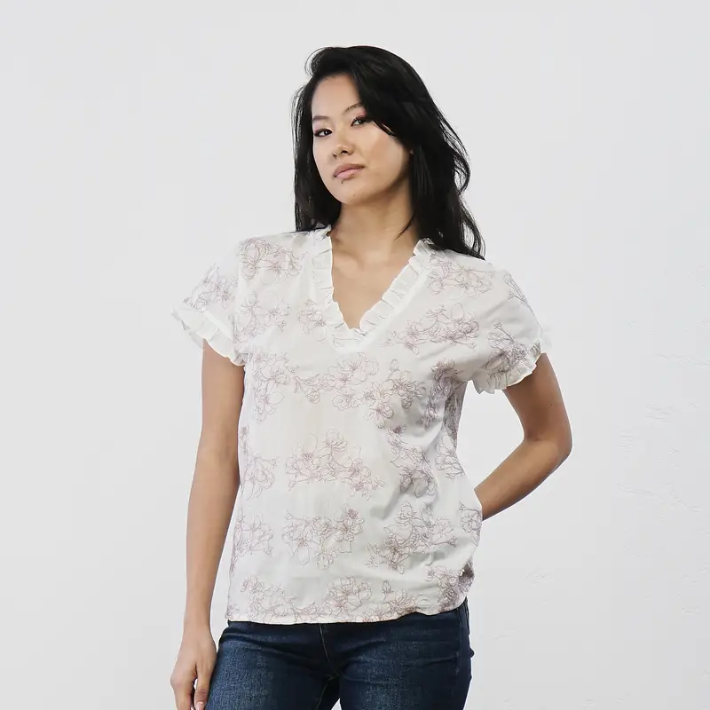 Camicia bianca da donna in cotone con ricami floreali