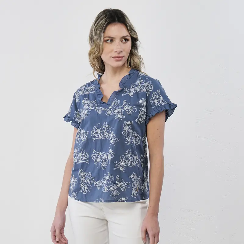 Camicia blu da donna in cotone con ricami floreali